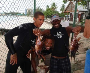 The guys a little too happy to have the largest Lionfish culled to date 14inches ... oh dear ...