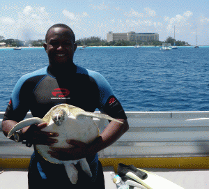 Daren from the BSTP holding a Green Sea Turtle